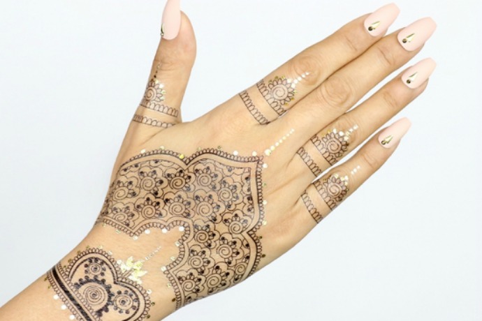 Huda Beauty Tattoos