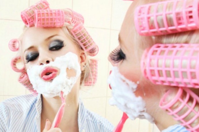 woman shaving facial