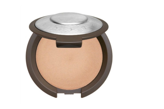 Becca Shimmering Skin Perfecctor Champagne Pop poured cream