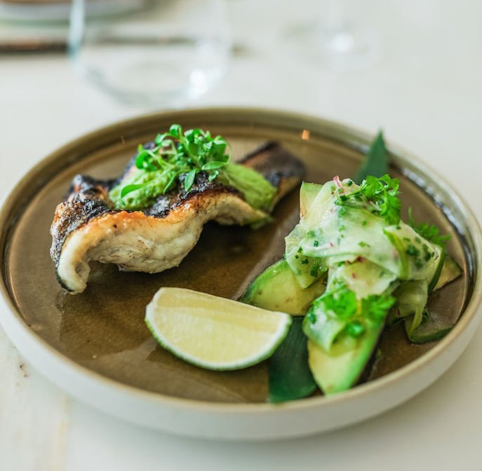 Super green sea bass with grilled sumac avocado salad